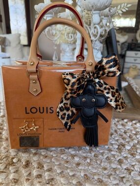Authentic Louis Vuitton shopping bag 
Orange Clear Tote upcycled enclosed in pvc